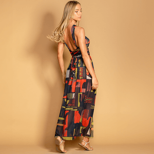 Vestido longo em tule, frente única e fendas laterais. Estampa encantadora e design elegante. Leveza e sofisticação para ocasiões especiais!