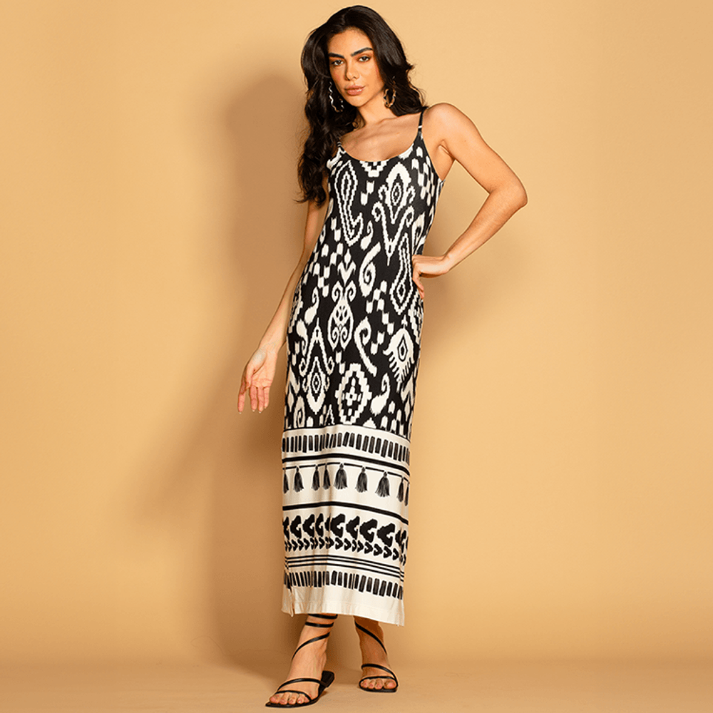 Vestido de tricô com estampa floral, alças finas. Elegância e conforto para arrasar em qualquer ocasião de verão.