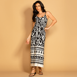 Vestido de tricô com estampa floral, alças finas. Elegância e conforto para arrasar em qualquer ocasião de verão.