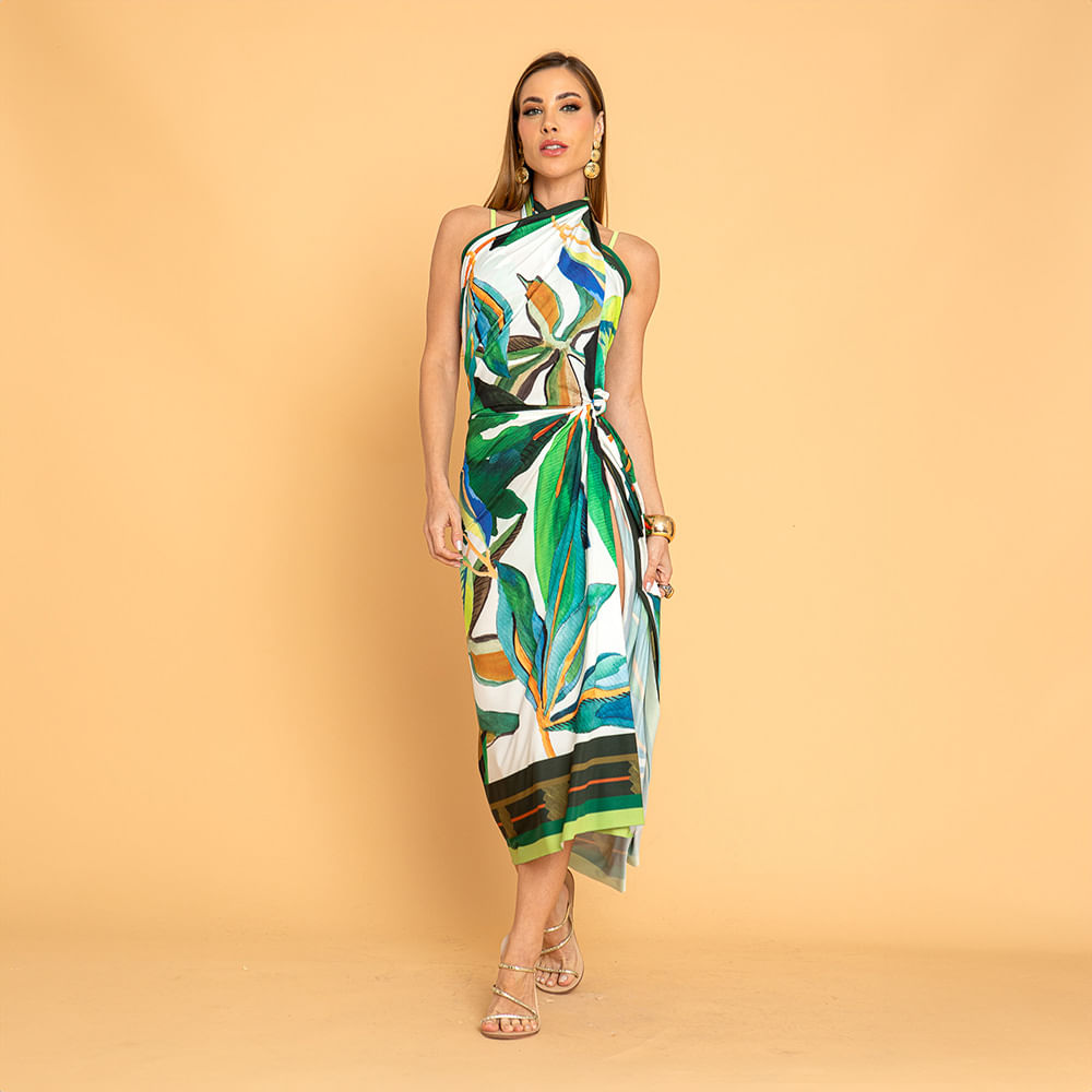 Canga versátil 1,50x1,50m com multi amarrações, estampa tropical e toque suave. Ideal para looks únicos e confortáveis no verão.